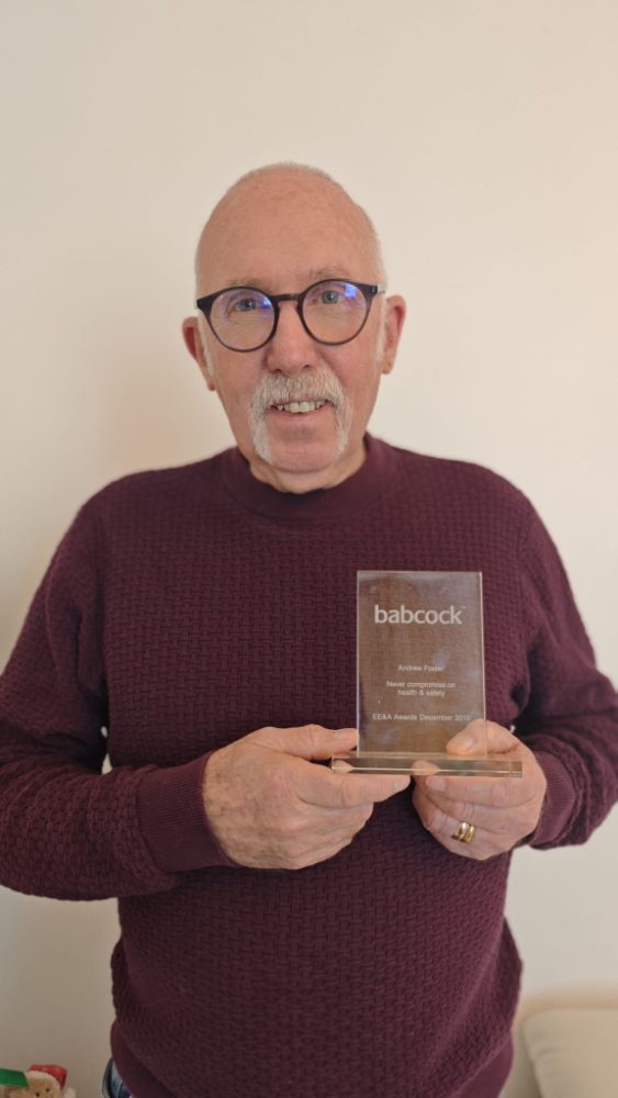Paul Foster holding his Babcock International EE&A Award engraved 'Never compromise on health & safety'